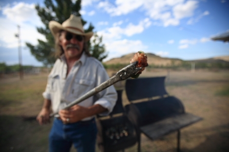 Yours truly grilling some jalopena poppers at camp site during field trip